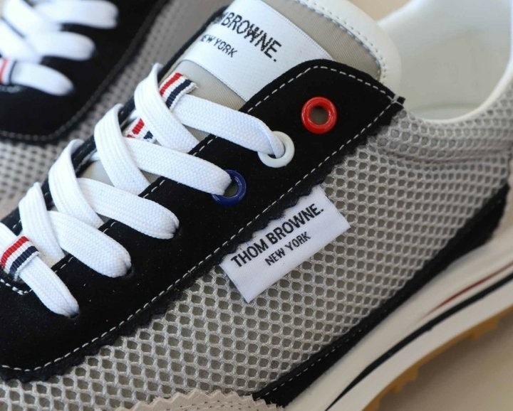 톰브라운 파인 키드 스웨이드 테크 러너