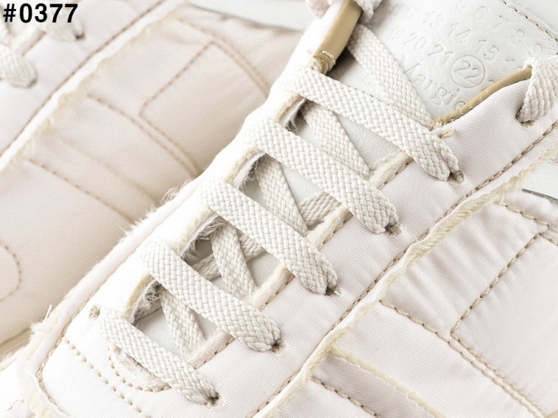 메종 마르지엘라 빈티지 러너 에볼루션 스니커즈