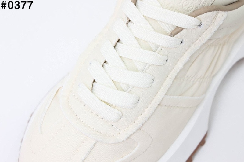 메종 마르지엘라 빈티지 러너 에볼루션 스니커즈