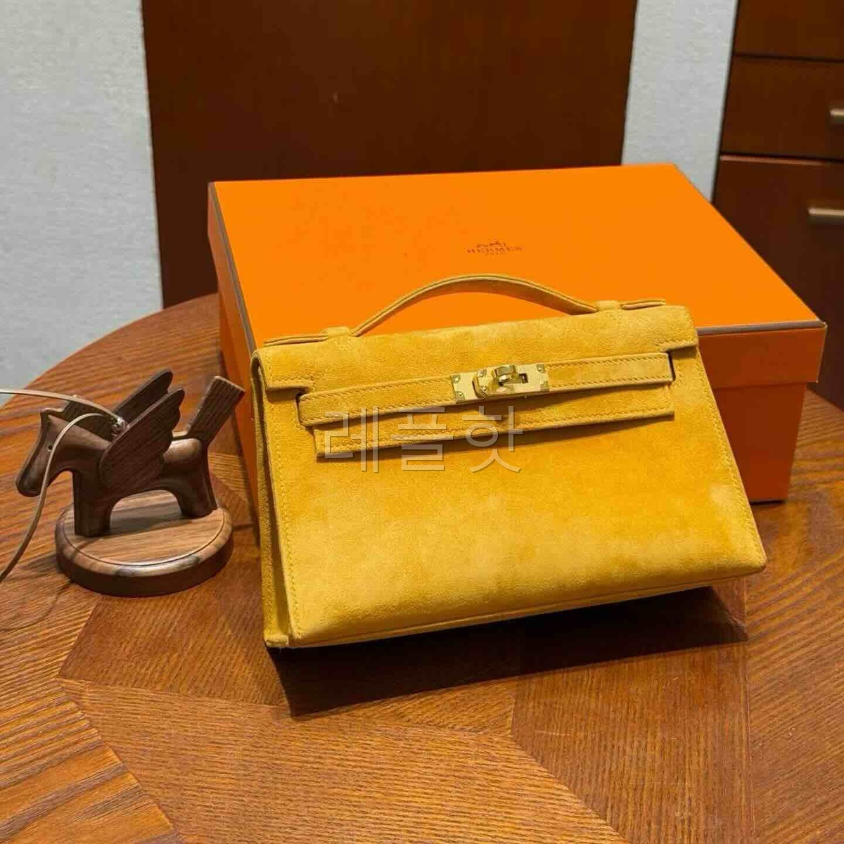 Hermès Kelly Pochette Jaune Doré Suede x Gold Hardware