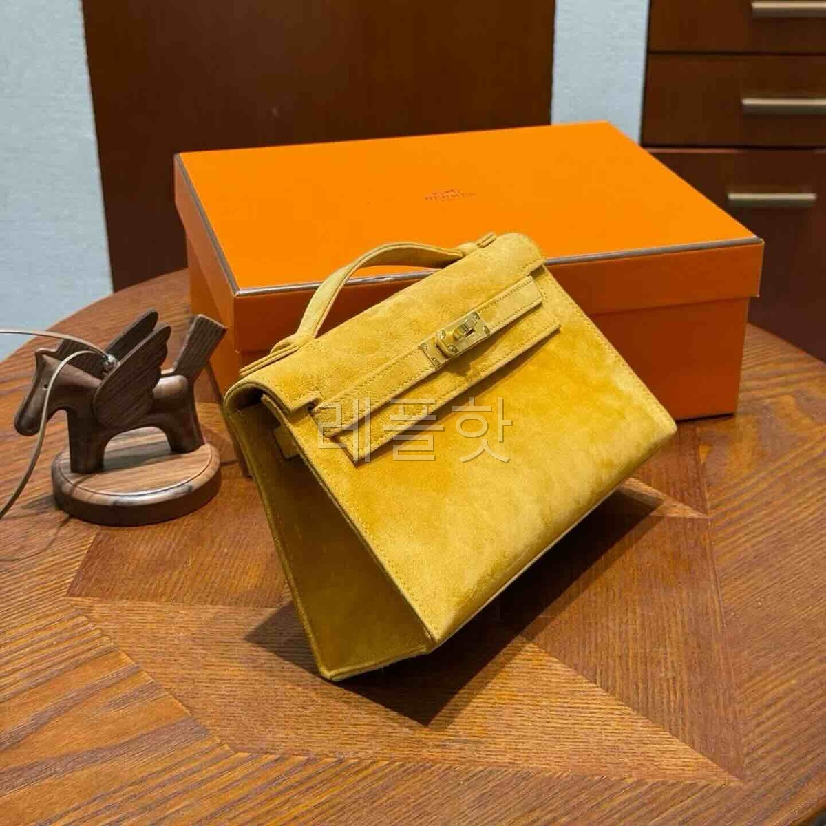 Hermès Kelly Pochette Jaune Doré Suede x Gold Hardware