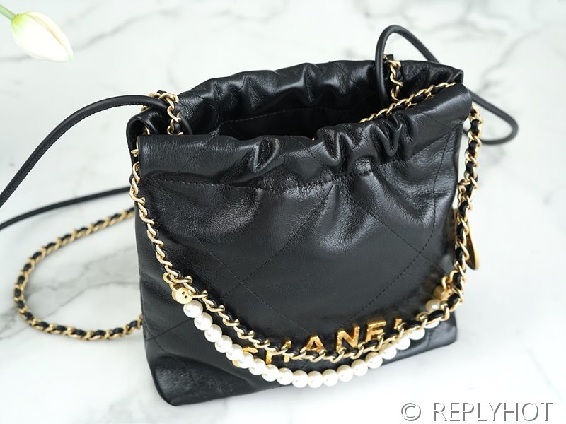 [하이엔드급] 샤넬 22 진주 미니 핸드백 카프스킨 크리스탈 펄 블랙 [매장가 900만원대]