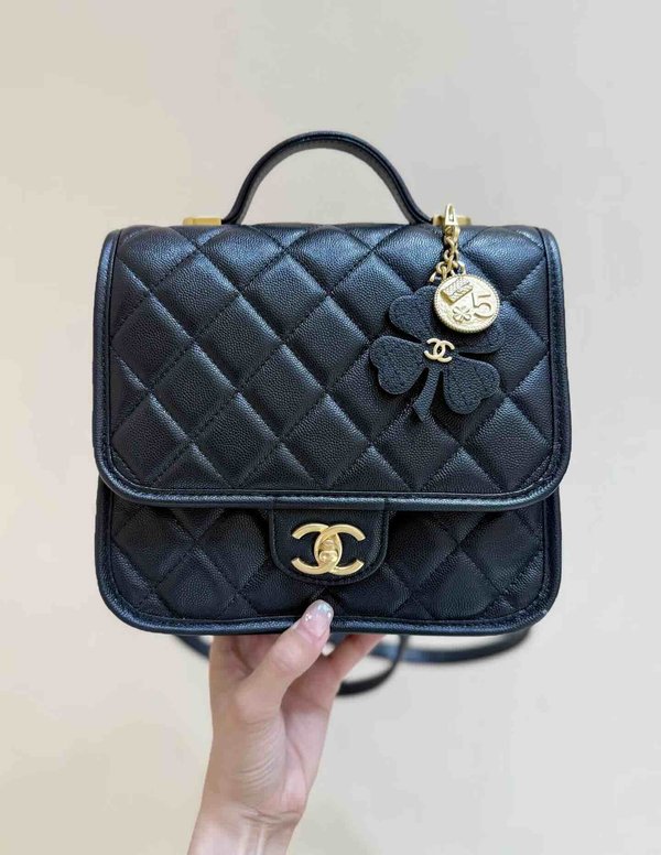 Chanel 25B Coin Clover Backpack Black Grained Calfskin GHW 22cm