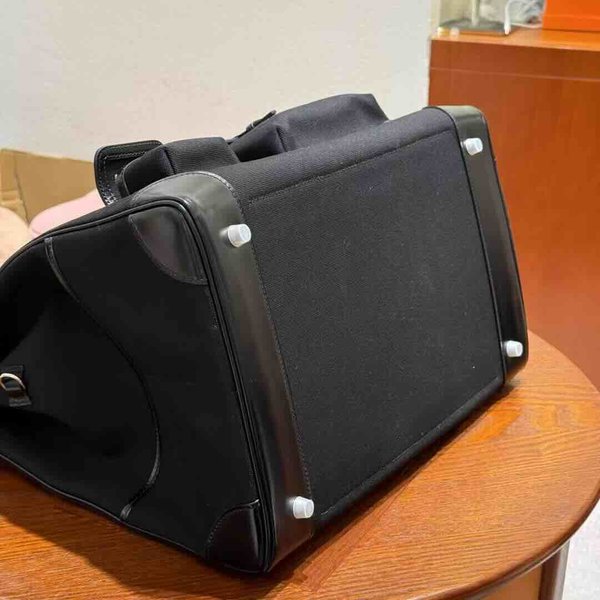 Hermès HAC 40 Noir Box / Black-Navy Canvas x Palladium Hardware