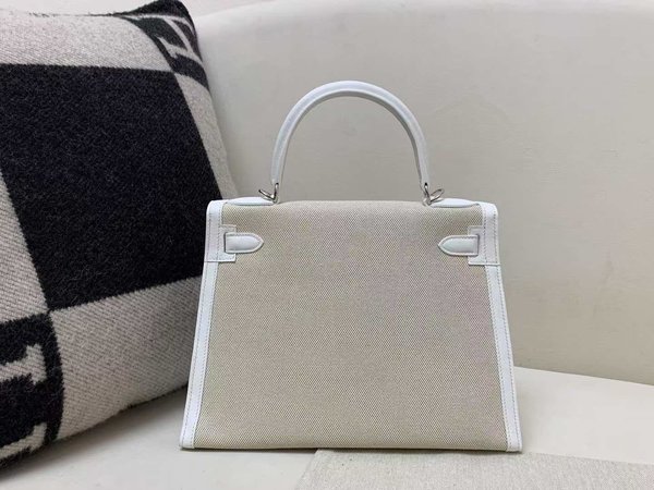 Hermès Kelly 25 Ecru Toile & Veau Togo Blanc Argent