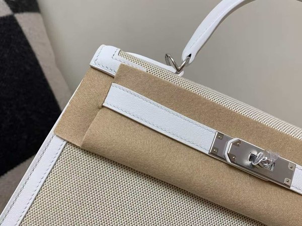 Hermès Kelly 25 Ecru Toile & Veau Togo Blanc Argent