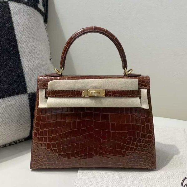 Hermès Kelly 25 Sellier Shiny Porosus Crocodile Miel with Gold Hardware