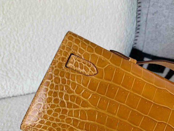 Hermès Kelly Cut 31 Shiny Porosus Crocodile Amber (Gold Family) x Gold Hardware