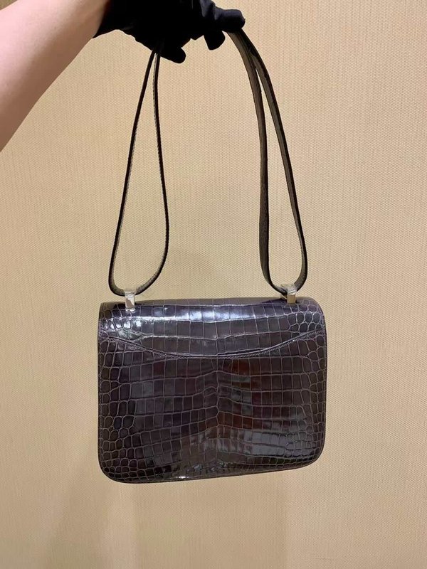 Hermès Constance 18 in Shiny Porosus Crocodile, Noir, Palladium Hardware