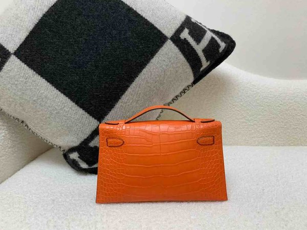 Hermès Pochette Matte Alligator Orange with Gold Hardware