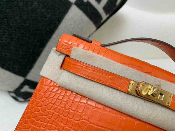 Hermès Pochette Matte Alligator Orange with Gold Hardware