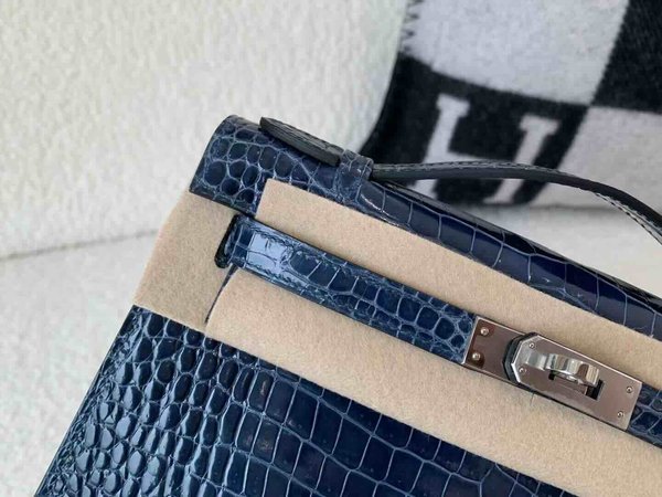 Hermès Pochette Shiny Porosus Crocodile Storm Blue x Palladium Hardware