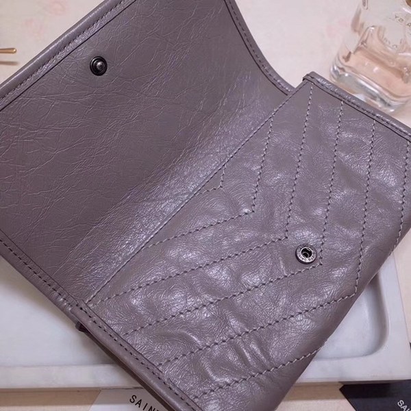 입생로랑 니키 생로랑 장지갑 583552