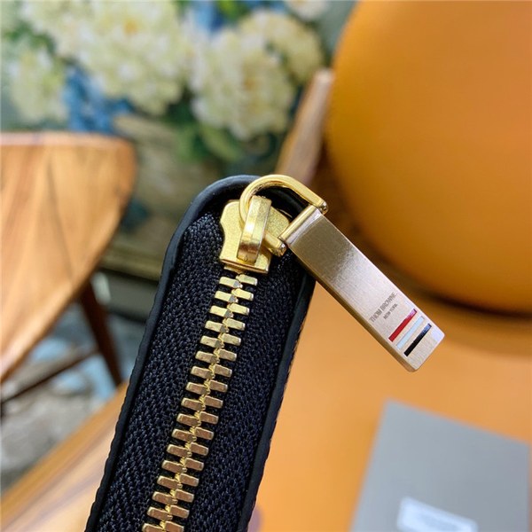 톰브라운 지퍼 장지갑 TB1584010