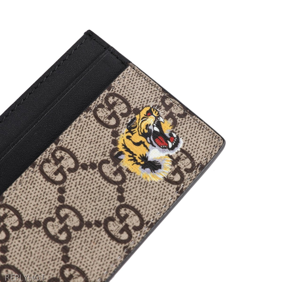 구찌 베스트리에 타이거 프린트 카드 지갑