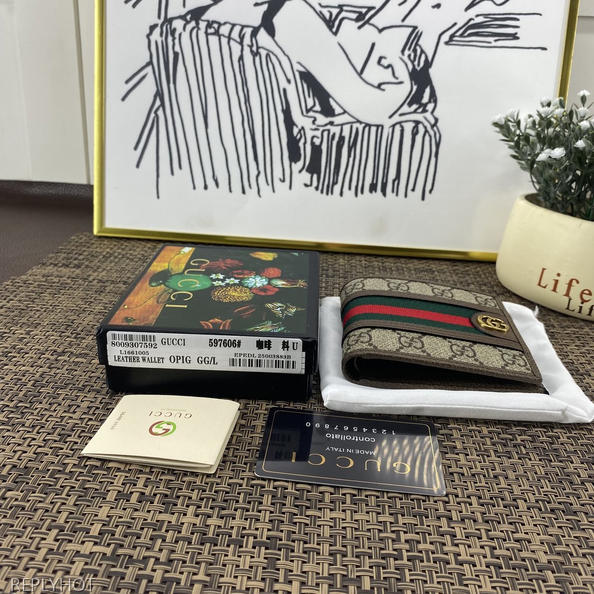 구찌 지갑 597606
