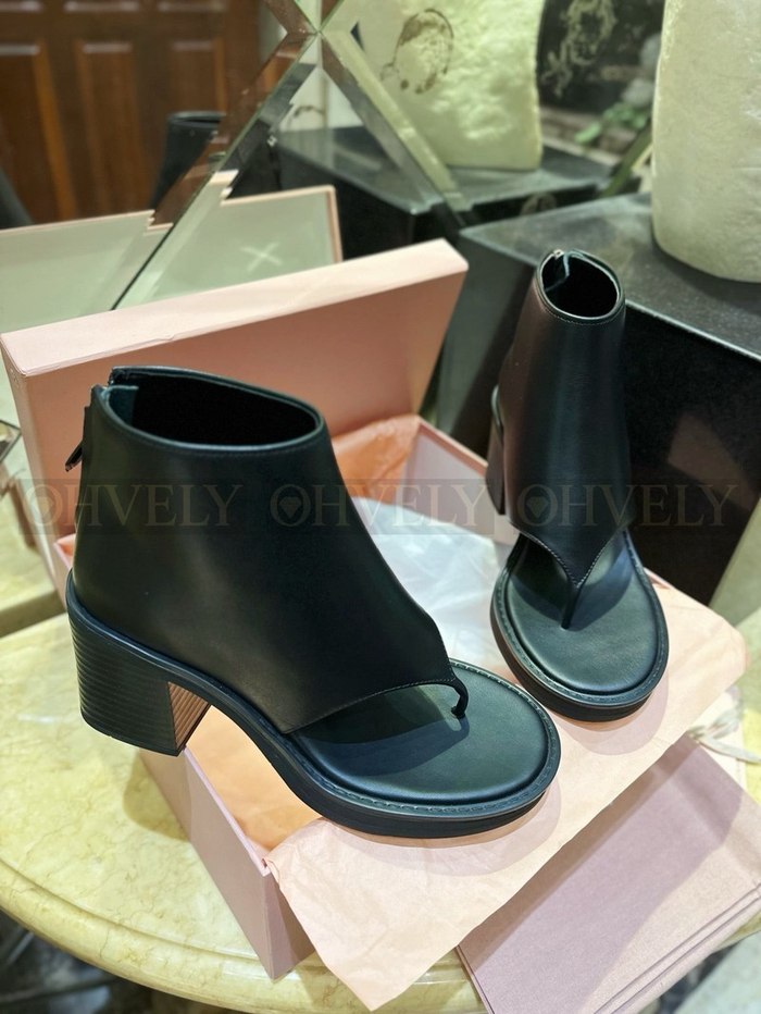 미우미우 레더 통 부츠